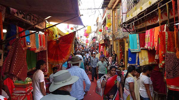 Market street with colorful fabrics on display